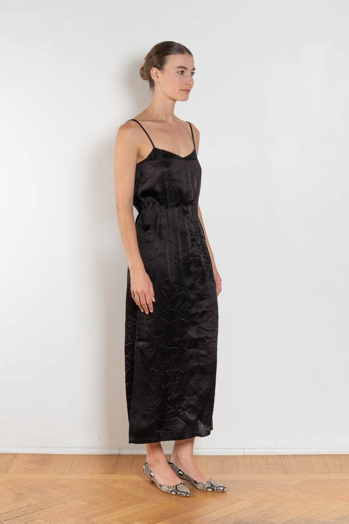 The Little Black Dress by Nackiye is a delicate slip dress with a gathered waist and mesh details
