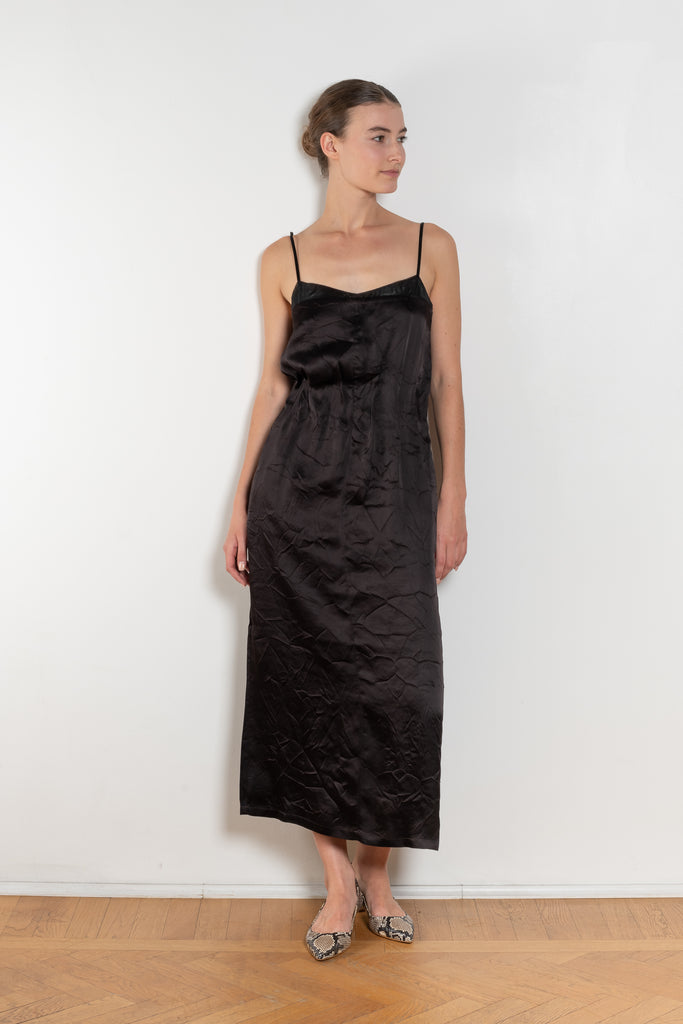 The Little Black Dress by Nackiye is a delicate slip dress with a gathered waist and mesh details