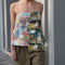 The Petit Jardin Top by Nackiye is a strappy top in foulard with adjustable straps