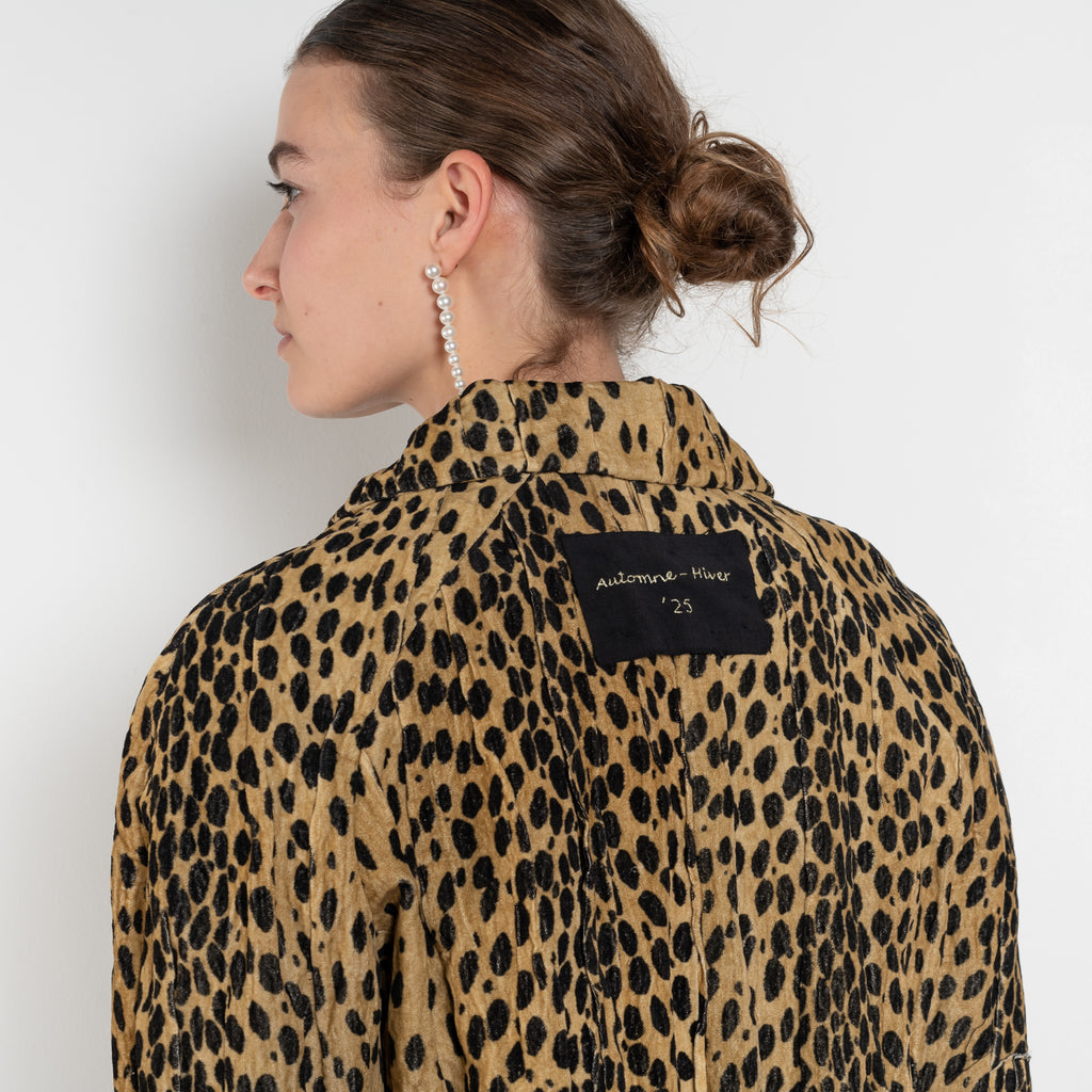 The Pixie Jacket by Nackiye has a cropped silhouette, leopard print & sleeves with two front pockets and elbow patches