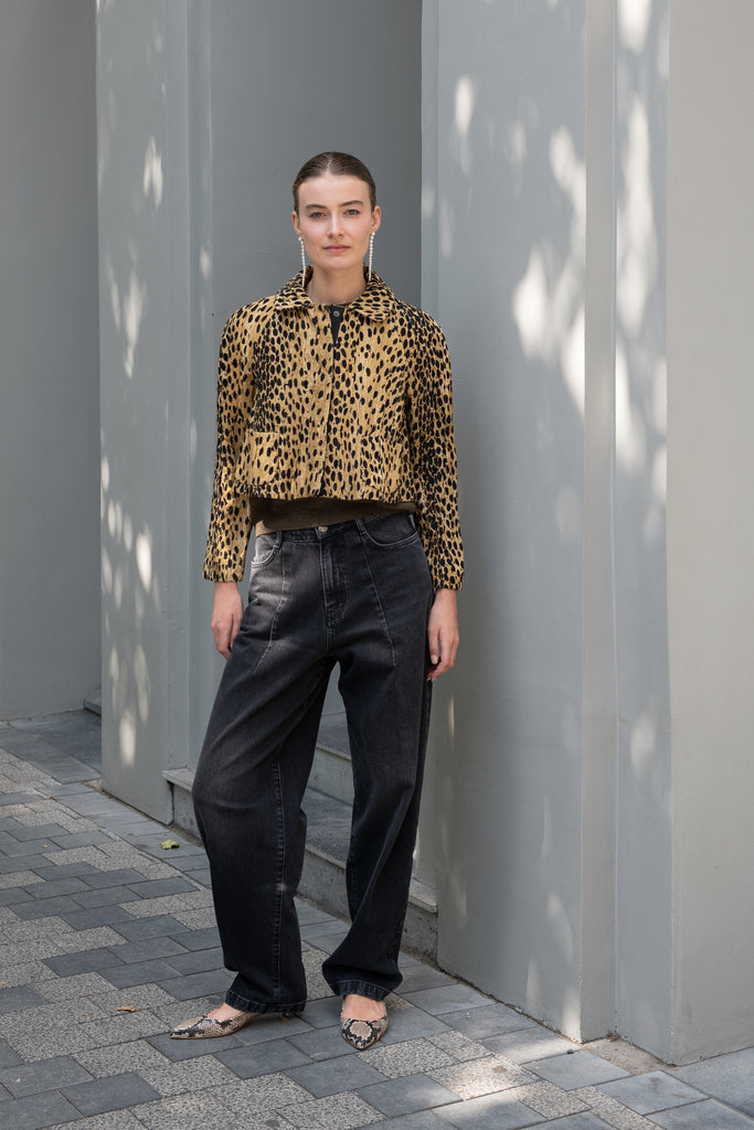 The Pixie Jacket by Nackiye has a cropped silhouette, leopard print & sleeves with two front pockets and elbow patches
