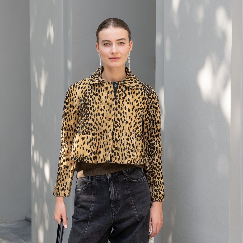 The Pixie Jacket by Nackiye has a cropped silhouette, leopard print & sleeves with two front pockets and elbow patches