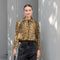The Pixie Jacket by Nackiye has a cropped silhouette, leopard print & sleeves with two front pockets and elbow patches