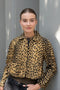 The Pixie Jacket by Nackiye has a cropped silhouette, leopard print & sleeves with two front pockets and elbow patches