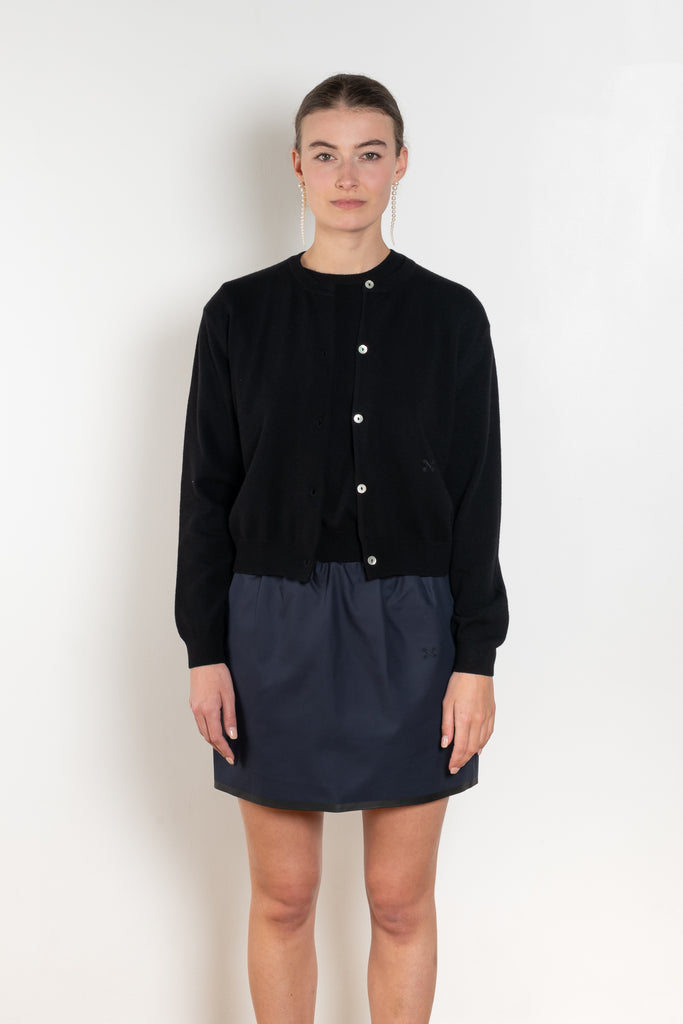 The Sea Shell Cardigan by Nackiye is a beautiful lightweight cashmere cardigan with mother of pearl buttons and lightly ribbed cuffs