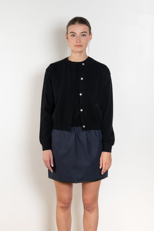 The Sea Shell Cardigan by Nackiye is a beautiful lightweight cashmere cardigan with mother of pearl buttons and lightly ribbed cuffs