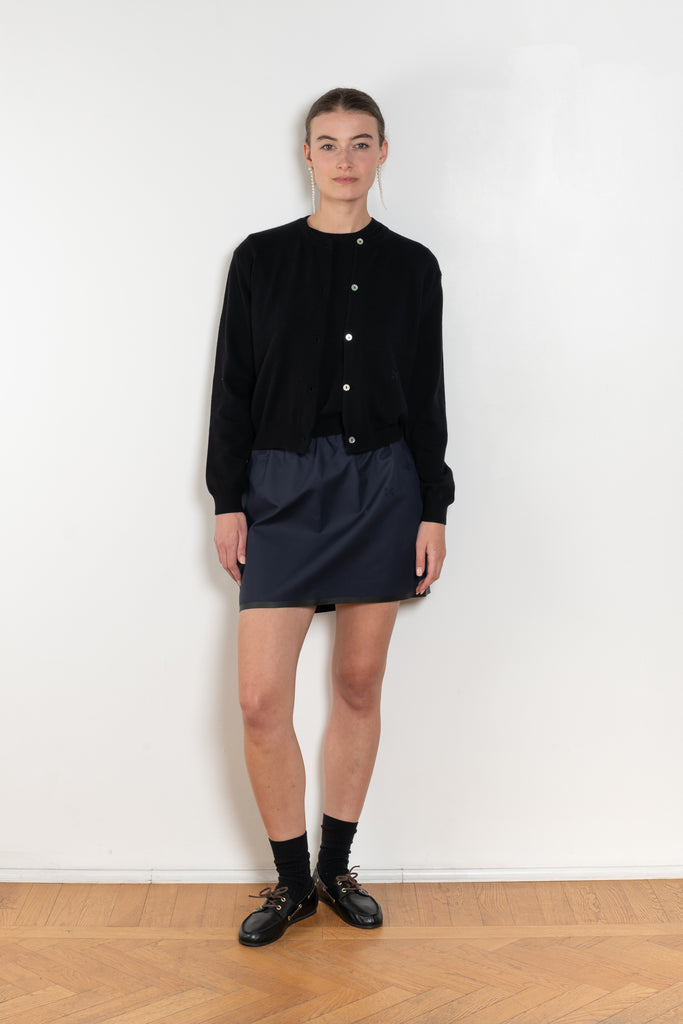 The Sea Shell Cardigan by Nackiye is a beautiful lightweight cashmere cardigan with mother of pearl buttons and lightly ribbed cuffs