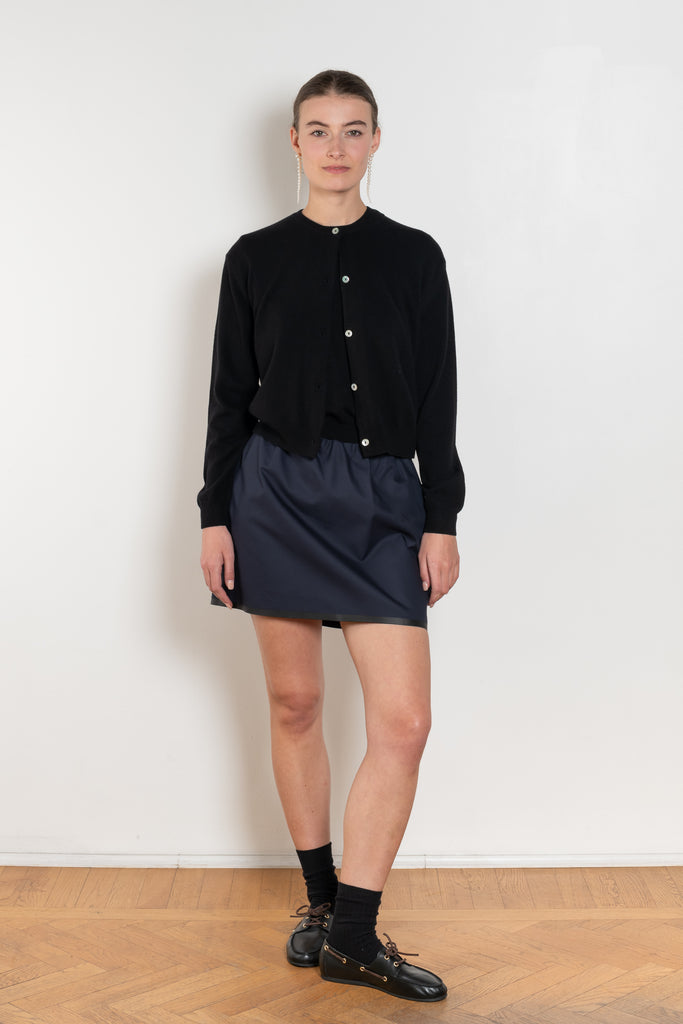 The Sea Shell Cardigan by Nackiye is a beautiful lightweight cashmere cardigan with mother of pearl buttons and lightly ribbed cuffs