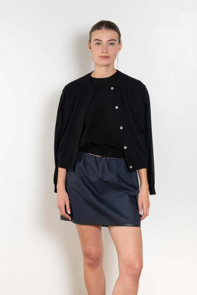 The Sea Shell Cardigan by Nackiye is a beautiful lightweight cashmere cardigan with mother of pearl buttons and lightly ribbed cuffs