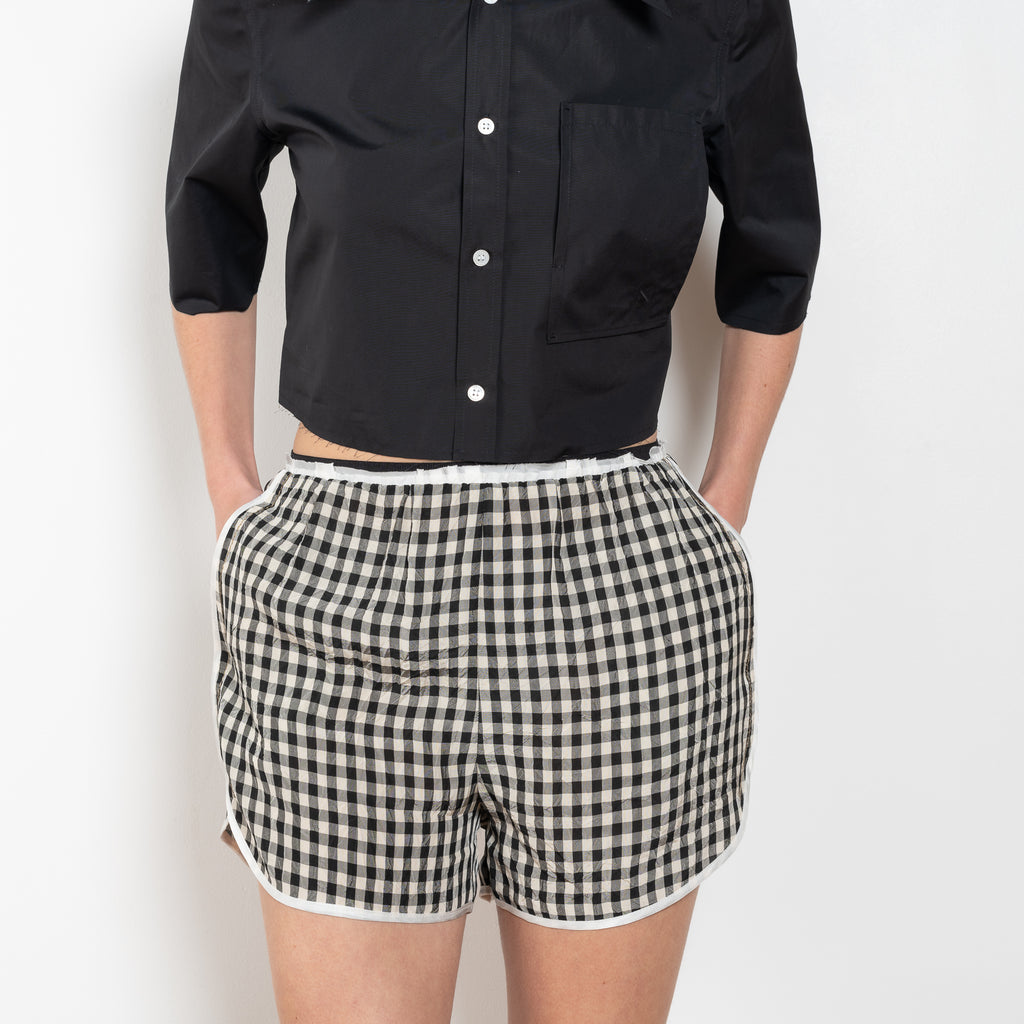 The Short But Sweet Shorts by Nackiye are olympic inspired shorts with piping detail.