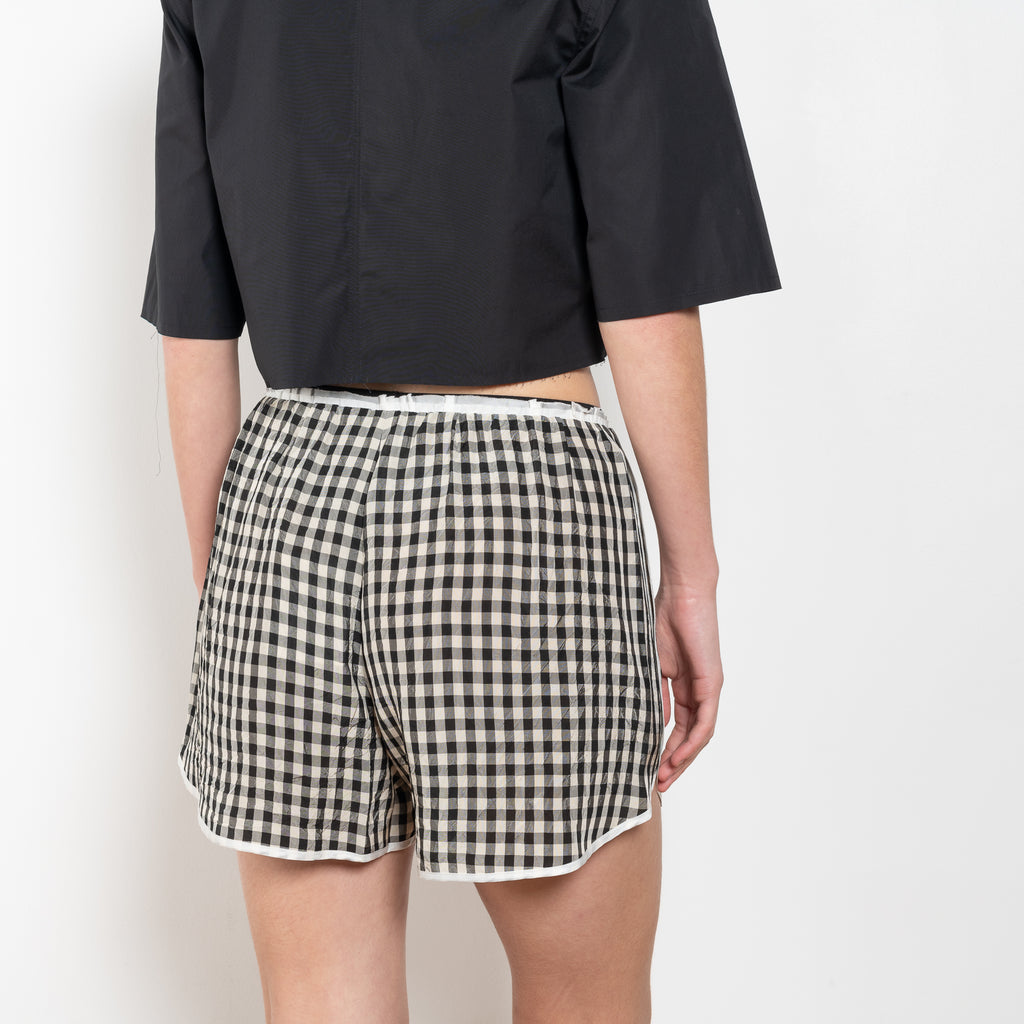 The Short But Sweet Shorts by Nackiye are olympic inspired shorts with piping detail.