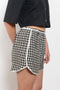 The Short But Sweet Shorts by Nackiye are olympic inspired shorts with piping detail.