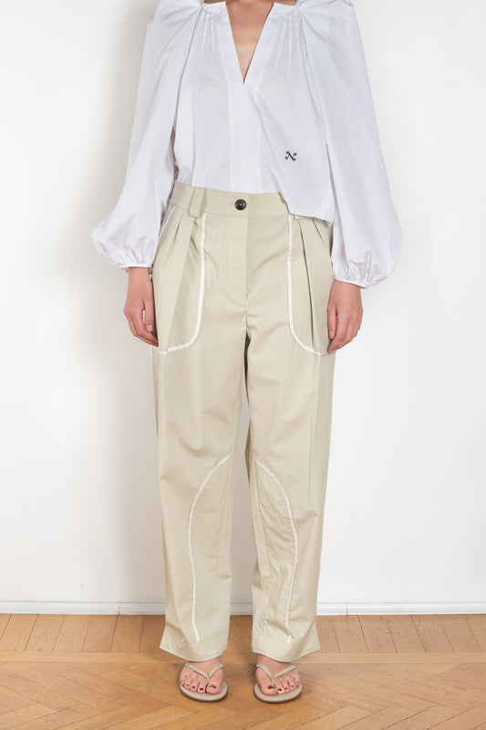 The Weekend Pants by Nackiye is a cargo inspired pants with exaggerated piping details along the pockets and inner bottom hems