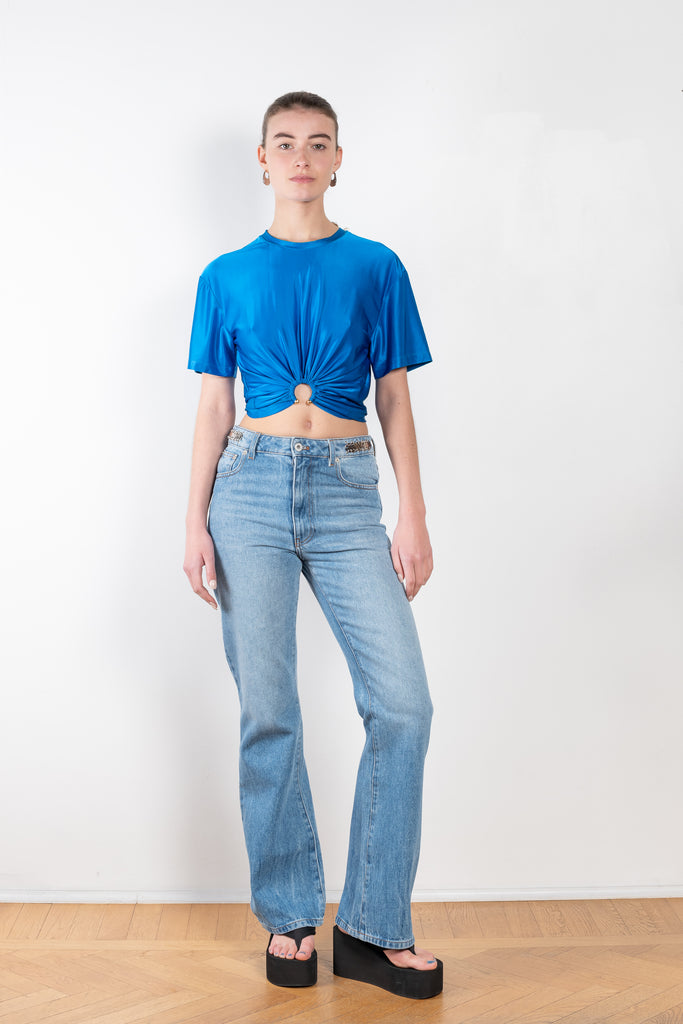 The Jersey Crop Top by Paco Rabanne is a cropped top fitted at the wasit with a silver finish ring