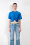 The Jersey Crop Top by Paco Rabanne is a cropped top fitted at the wasit with a silver finish ring