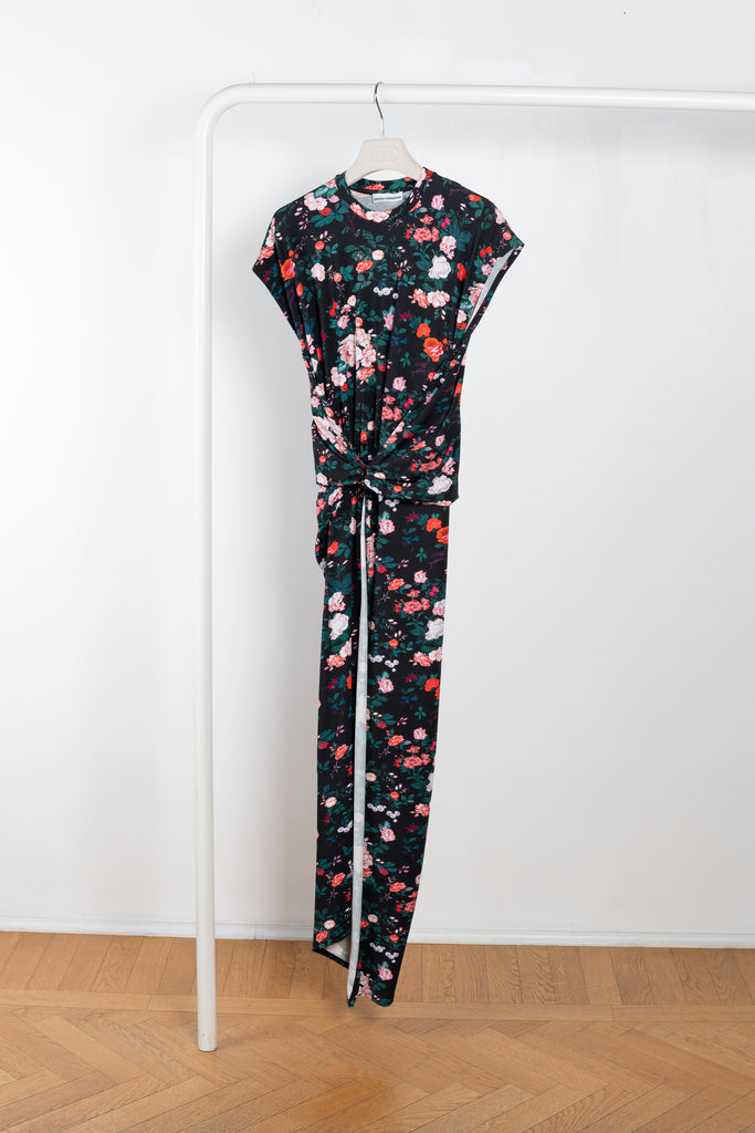 The Floral Dress by Paco Rabanne is a signature floral dress with cap sleeves and a twisted front