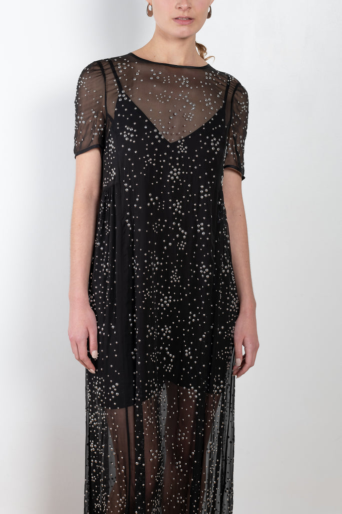The Silk Studded Dress by Paco Rabanne is a unique and delicate silk chiffon dress with PR signature  all over studs