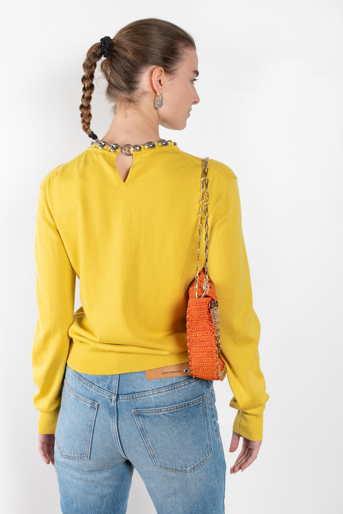 The Chain Knit by Paco Rabanne is a signature knit in bright yellow with chain details in a lightweight summer merino blend
