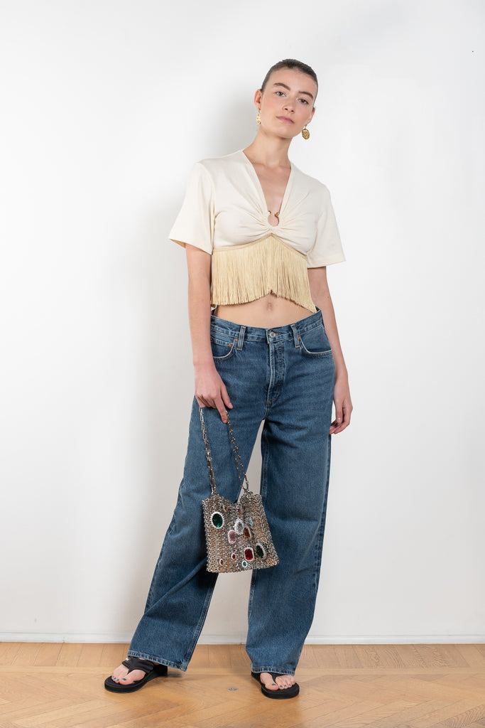 The Fringed Top by Paco Rabanne is a cropped top gathered with a silver ring and fringes 