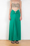 The Long Skirt by Paco Rabanne is a long flowy jersey skirt with a PR embellishment at the waist