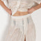 The Ada Skirt by SS Daley is a knee length pleated skirt in a cotton voile with a delicate embroidered print