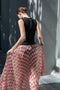 The Kate Pleated Skirt by SS Daley is a long pleated skirt in a silk voile with a delicate check print