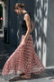 The Kate Pleated Skirt by SS Daley is a long pleated skirt in a silk voile with a delicate check print
