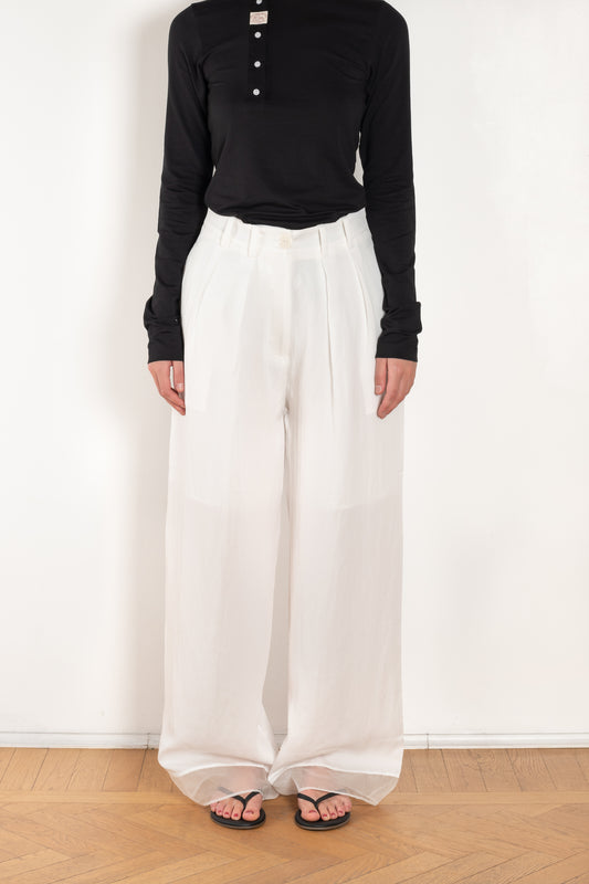 The Orla Trouser by SS Daley is a fluid silk trouser with a wide leg and a sheer hem