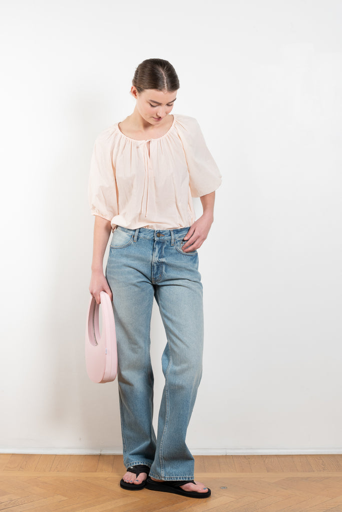 The Giana Top by Xirena has a rounded neckline with drawstring detail and puff sleeves with an elastic cuff in a signature soft and lightweight cotton