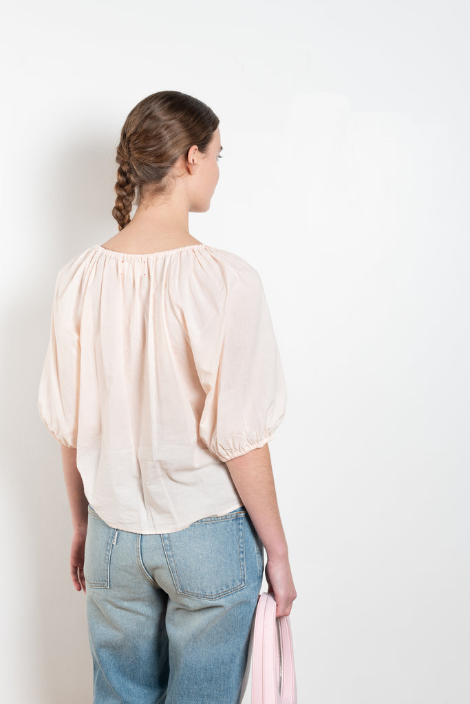The Giana Top by Xirena has a rounded neckline with drawstring detail and puff sleeves with an elastic cuff in a signature soft and lightweight cotton