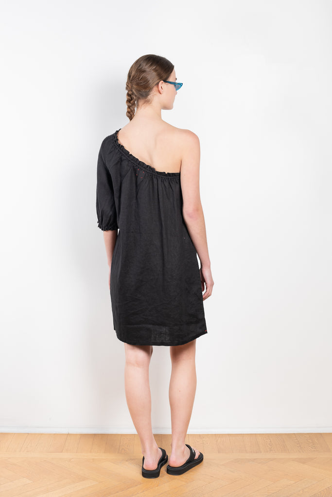 The Pippa Dress by Xirena  is a one-shoulder mini dress with a ruffle trim in a lightweight linen