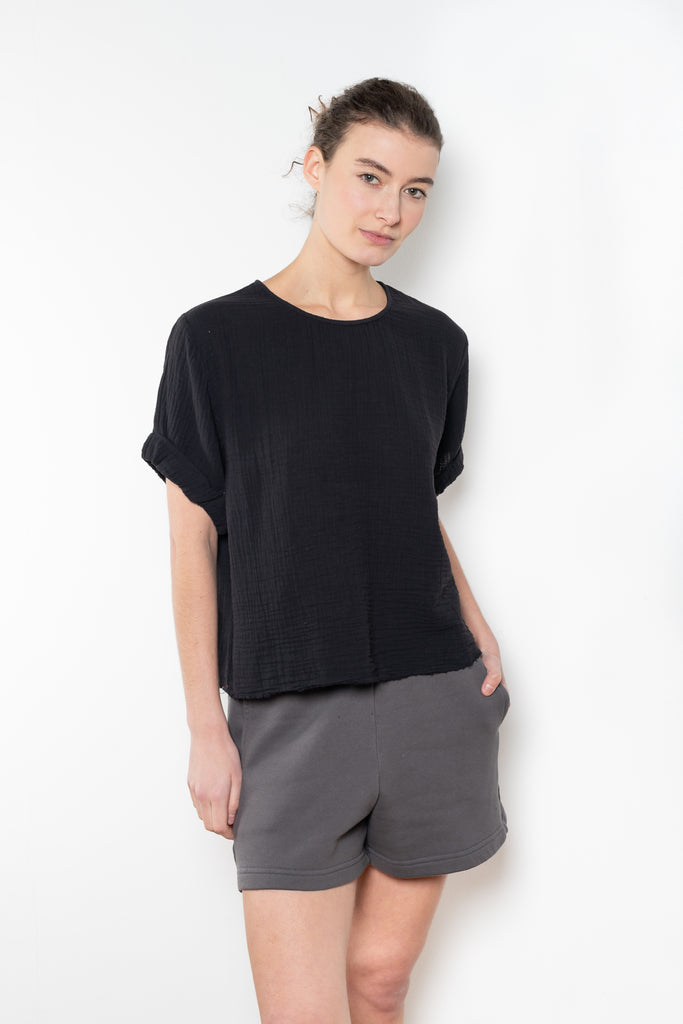 The Carson Top by Xirena is a soft cotton gauze top with a mother of pearl button fastening in the back