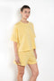 The Romeo Sweatshirt by Xirena is a soft fleece sweater with short sleeves in a slight cropped fit with a raw cut hem