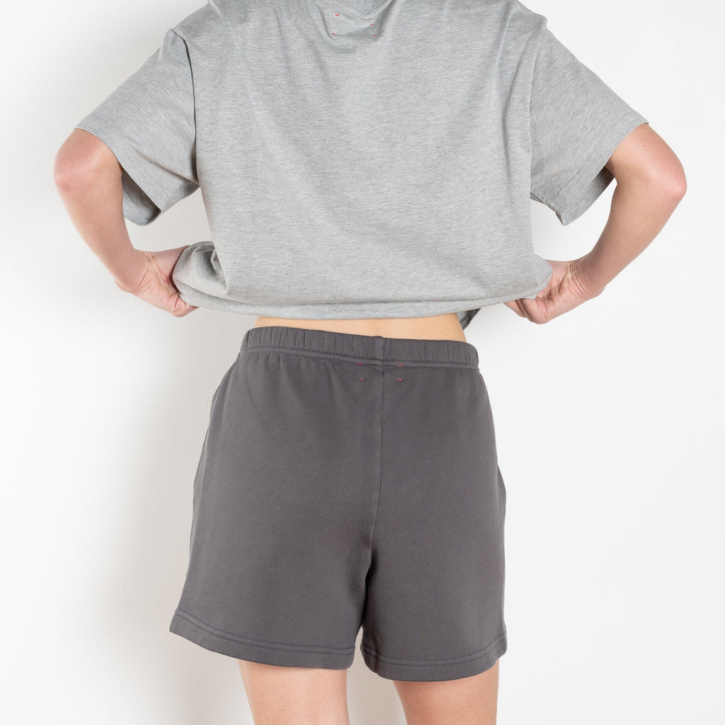 The Shayne Sweatshort by Xirena is a soft fleece short with a relaxed fit, small side slit and pockets