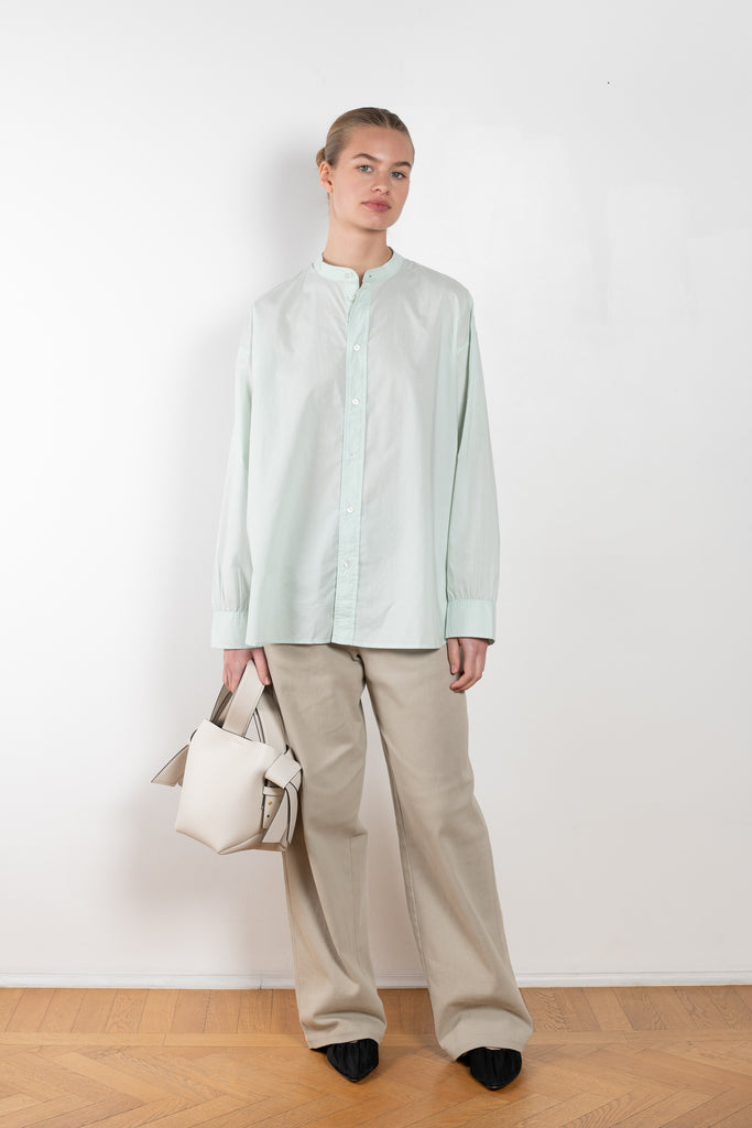 The Band Collar Shirt by 6397 is a signature oversized shirt in a crisp cotton poplin with dropped yoke at the back with gathering detail for volume
