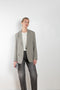 The Classic Blazer by 6397 is a signature blazer jacket with a slightly boxy and relaxed in fit in a light grey wool