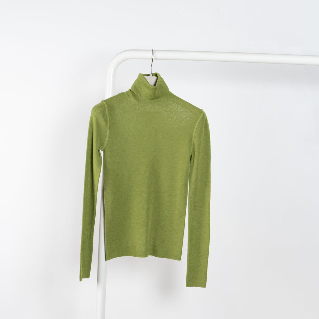 The Ribbed T Neck by 6397 is a second skin knit made from Italian extra fine merino 1x1 rib, it hugs the body and feels wonderful on