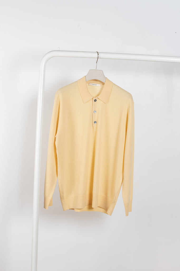The Slouchy Polo Knit by 6397 is a relaxed yet sophisticated cashmere polo sweater in a pale yellow