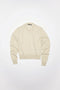 The Wool Vneck Sweater 43 by ACNE STUDIOS features a v-neckline with a ribbed collar, cuff and hem, and completed with a tonal face logo patch