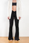 The Lindsay Pants by The Andamane is a fitted trouser with a v-line cut at the waist and maxi flared legs
