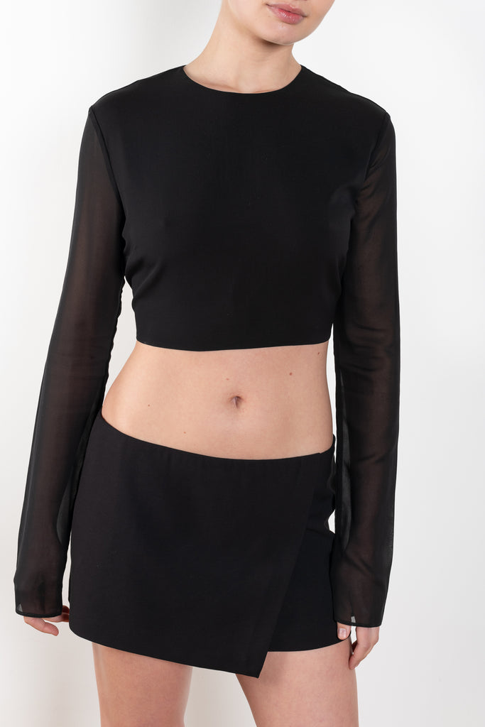 The Liza Skirt by The Andamane is a panneled micro skirt sitting low on the waist