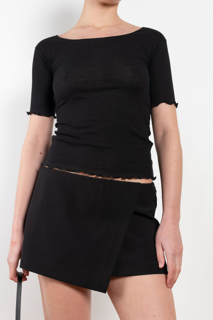 The Liza Skirt by The Andamane is a panneled micro skirt sitting low on the waist
