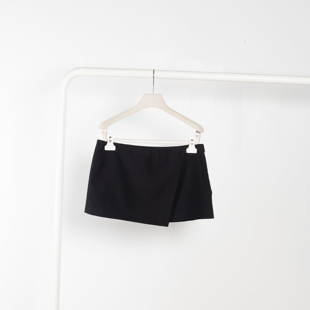 The Liza Skirt by The Andamane is a panneled micro skirt sitting low on the waist