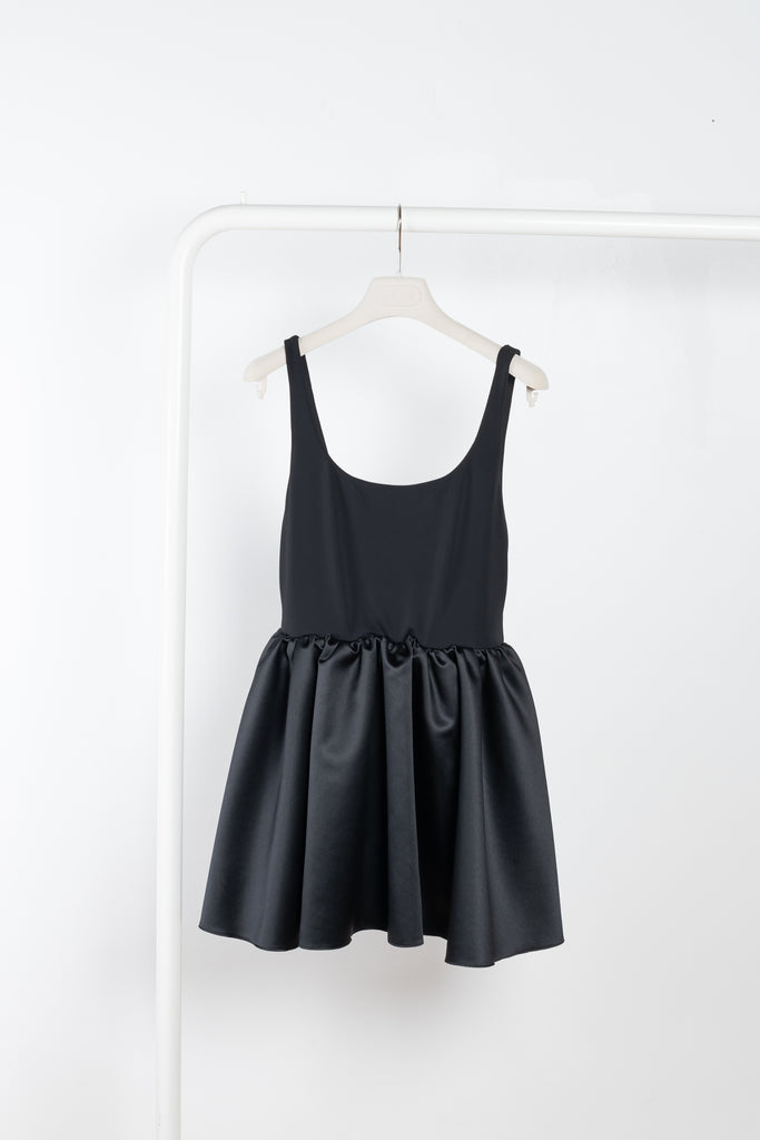 The Lola Dress by The Andamane is a ballerina inspired dress with a body upper and a flared mini skirt