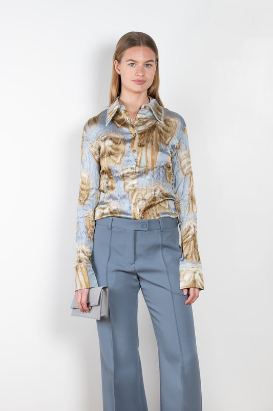 The Bow Print Shirt 853 by Acne Studios is a button up shirt with a bow print by artist Karen Kilimnik