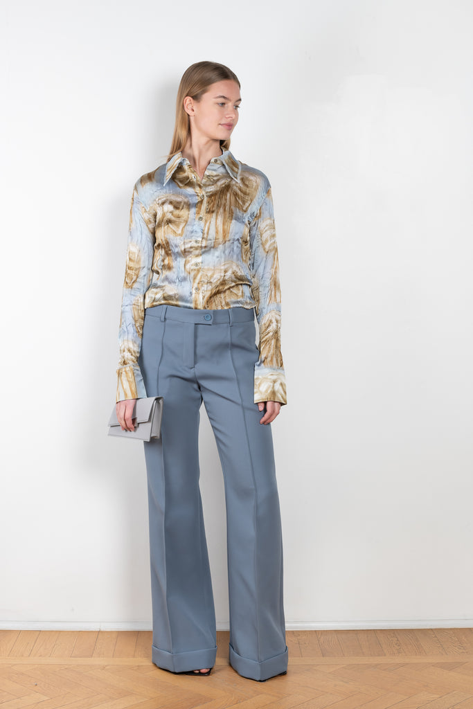 The Bow Print Shirt 853 by Acne Studios is a button up shirt with a bow print by artist Karen Kilimnik