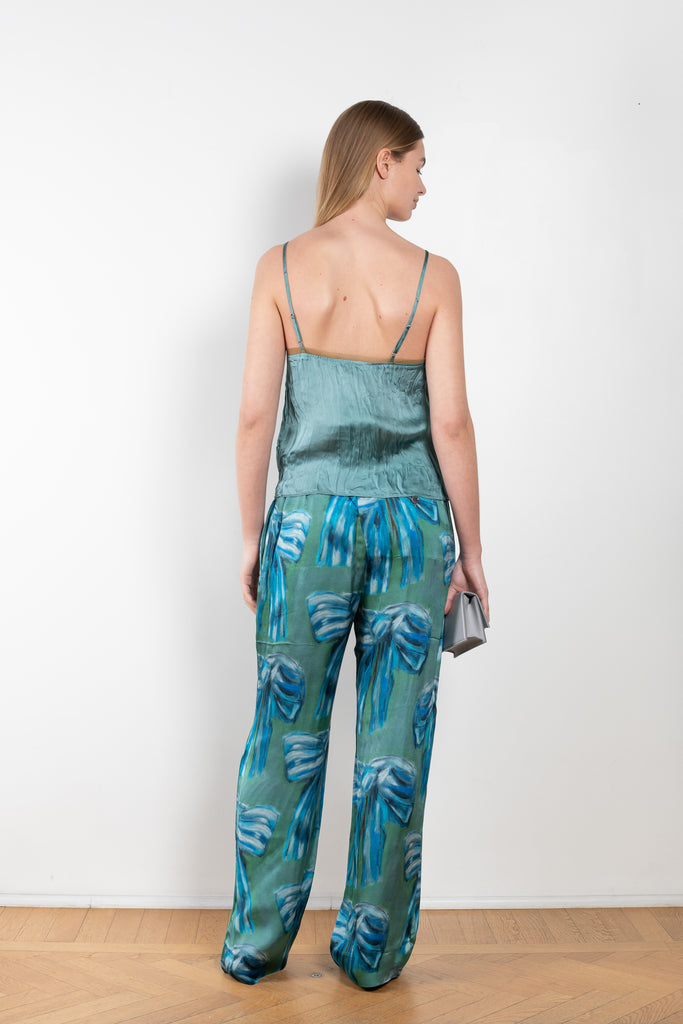 The Bow Print Trouser 1011 by Acne Studios is a crinkled trouser in a bow print by artist Karen Kilimnik with a loose volume on the legThe Bow Print Trouser 1011 by Acne Studios is a crinkled trouser in a bow print by artist Karen Kilimnik with a loose volume on the leg