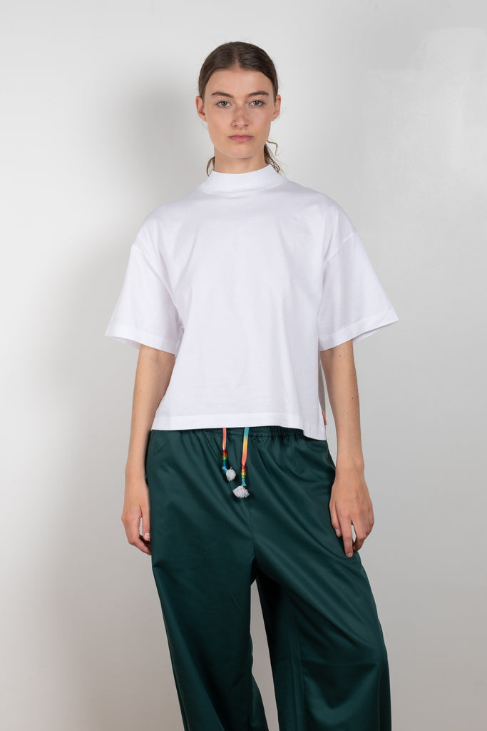 The Boxy T-shirt 240 by Acne Studios is a signature cropped and boxy tee with a mock neck, a true classic