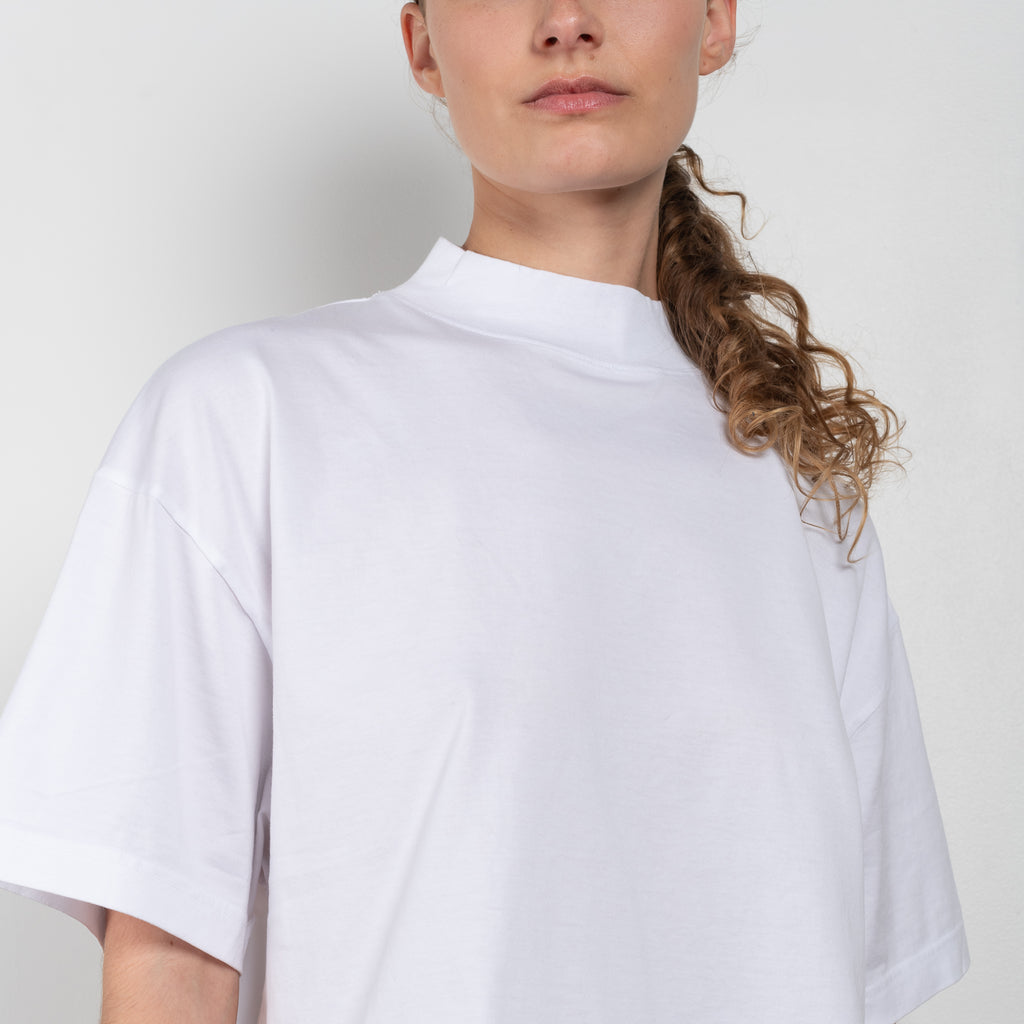 The Boxy T-shirt 240 by Acne Studios is a signature cropped and boxy tee with a mock neck, a true classic