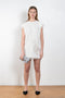 The Embroidered Dress 885 by Acne Studios is a short sleeved dress with a branded embroidery in this season's wedding theme, with contrast lace trims 